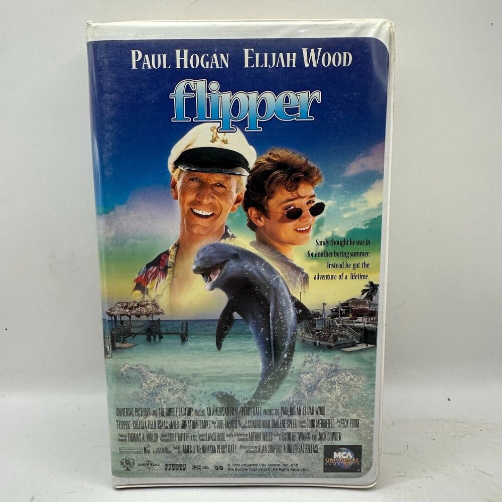 Flipper VHS 1996 Family Adventure Paul Hogan Elijah Wood Good Condition